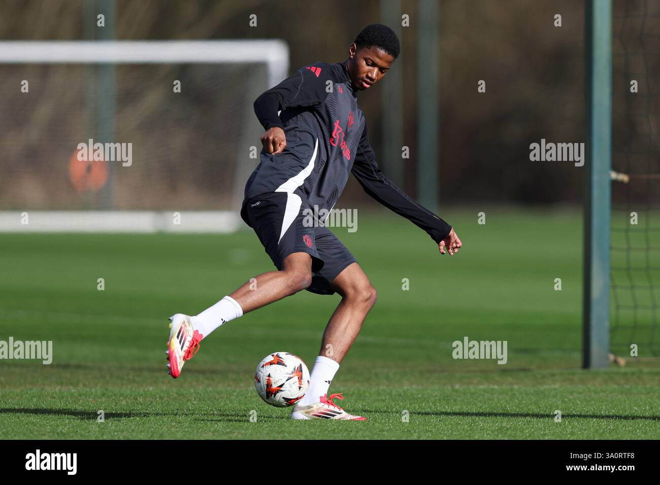 Manchester, UK. 05th Mar, 2025. Chido Obi-Martin of Manchester United during the Manchester United FC Training session ahead of the UEFA Europa League match vs Real Sociedad at Carrington Training Centre, Manchester, England, United Kingdom on 5 March 2025 Credit: Jake Kirkman/Every Second Media Credit: Every Second Media/Alamy Live News Stock Photo