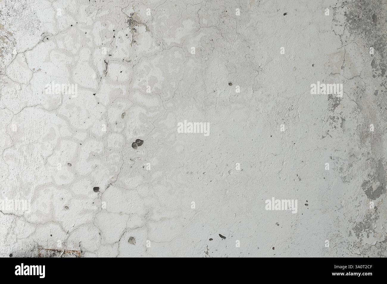 Gray-white wall with imperfections whose surface needs to be repaired Stock Photo