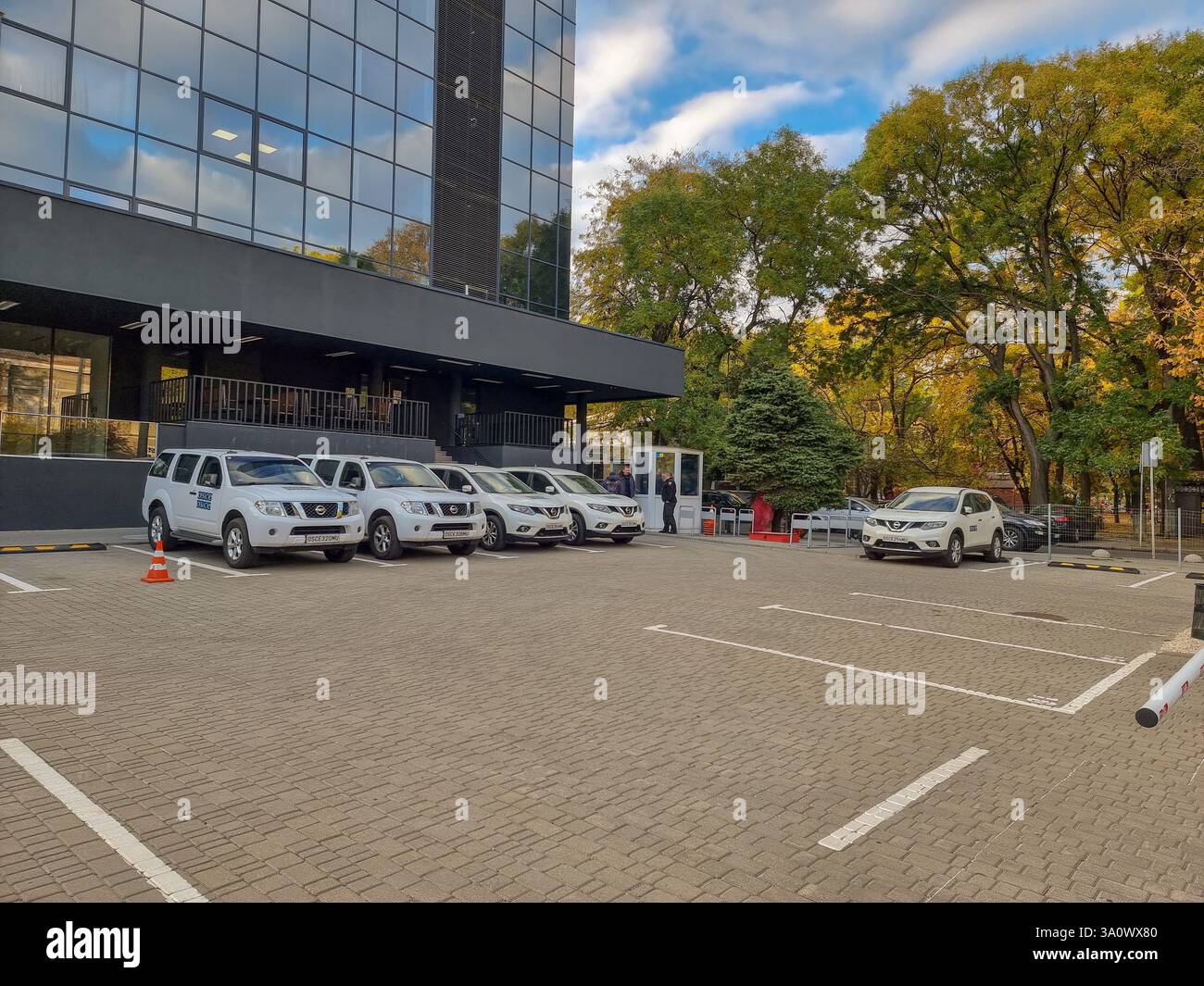 OSCE cars in front of office during OSCE Special Monitoring Mission to Ukraine (SMM) in Odesa / Odessa, Ukraine, 2014-2022; unarmed civilian mission - Smartphone Captured Stock Image