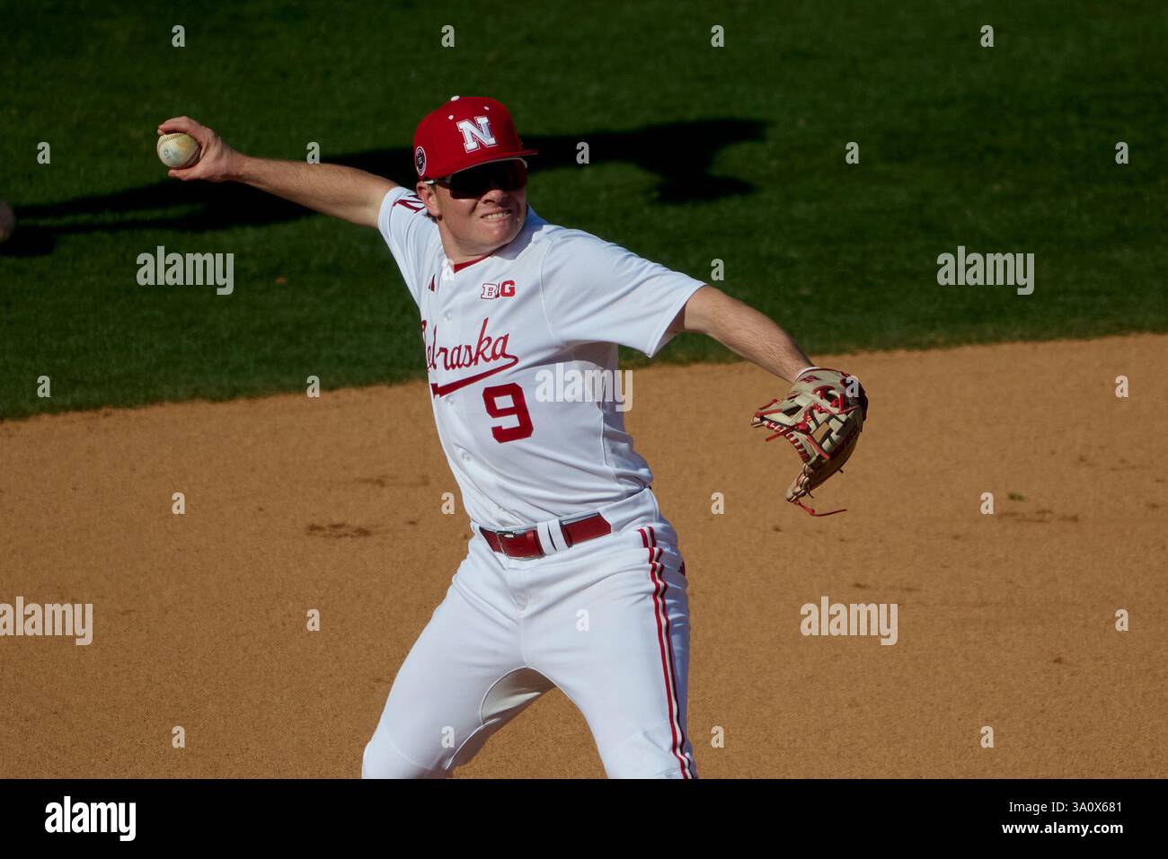 Nebraska Cornhuskers third baseman Rhett Stokes (9) throws to first ...