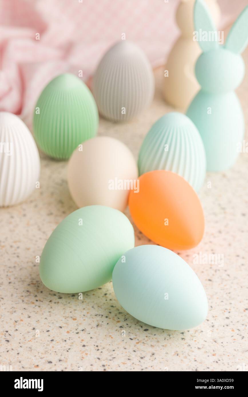Easter decoration. Colorful eggs on kitchen table. Stock Photo