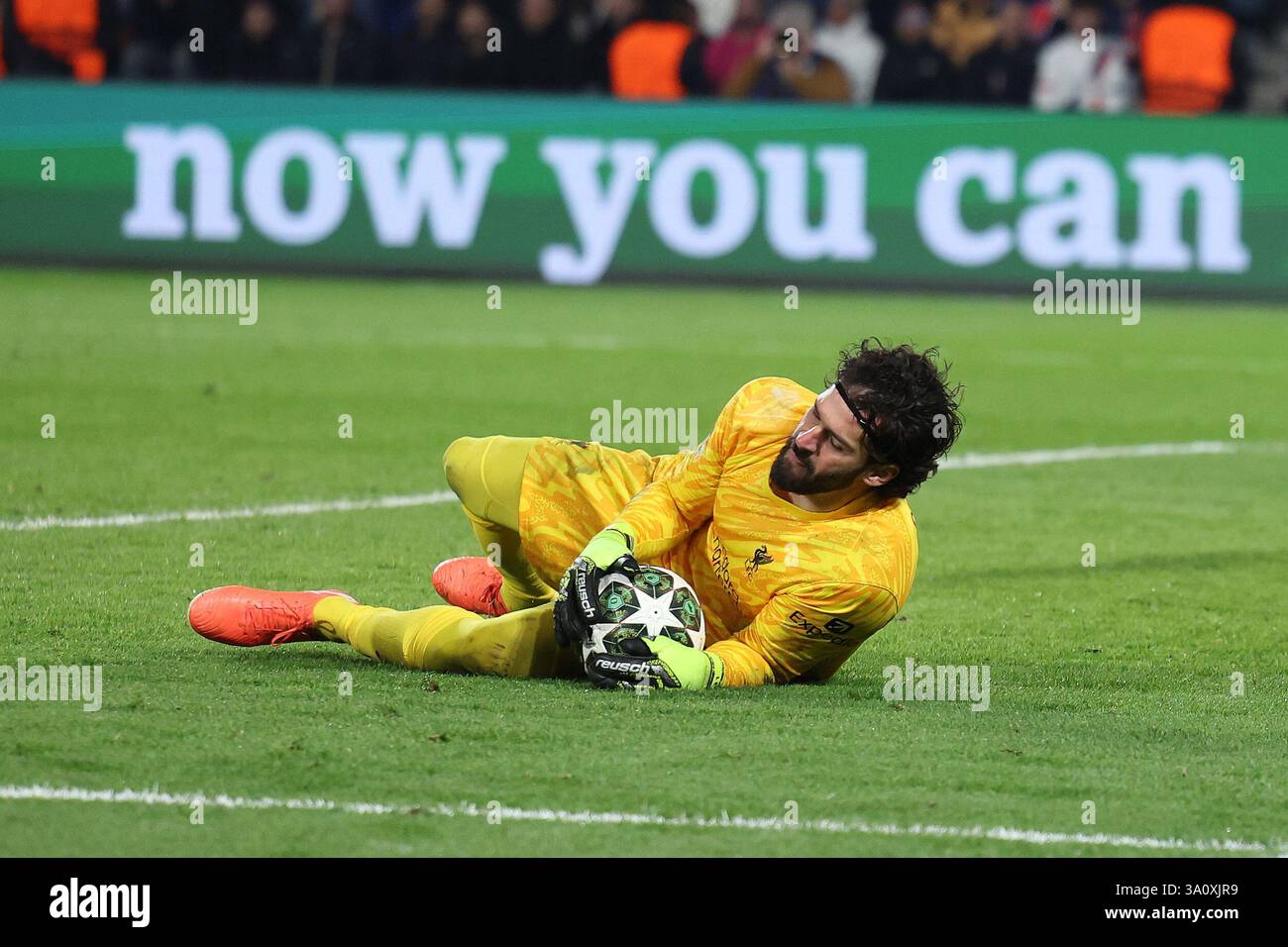 Paris, France. 5th Mar, 2025. Alisson Becker of Liverpool makes a save ...