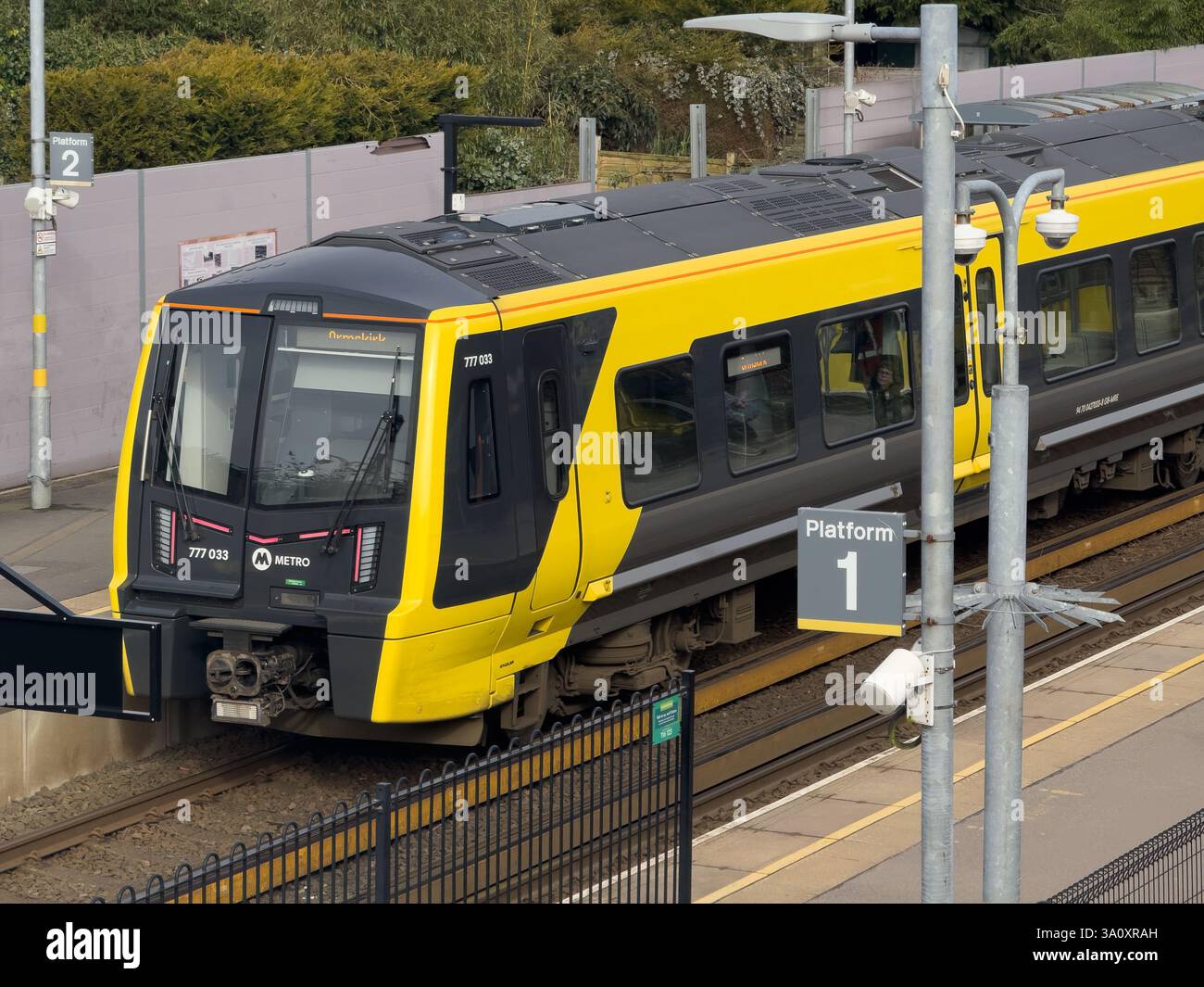 Maghull  North Train Station. Merseyrail train at station. - Smartphone Captured Stock Image