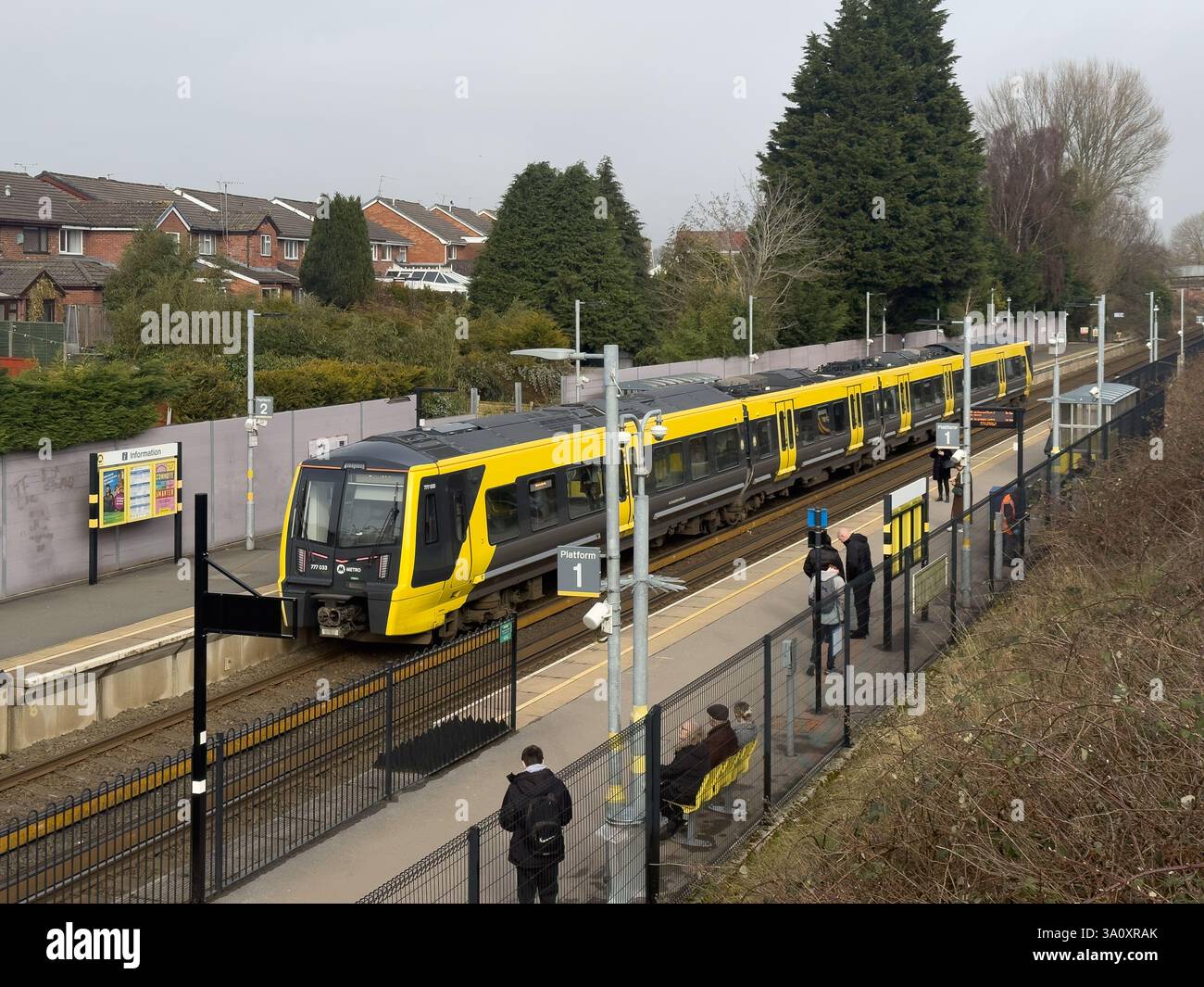 Maghull  North Train Station. Merseyrail train at station. - Smartphone Captured Stock Image