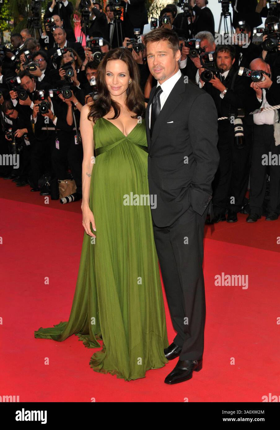 ANGELINA JOLIE & BRAD PITT."Kung Fu Panda" Gala Premiere at the 61st Annual  International Cannes Film Festival, Cannes, France, 15 May 2008..red carpet  Full length green dress pregnant black suit tie beard