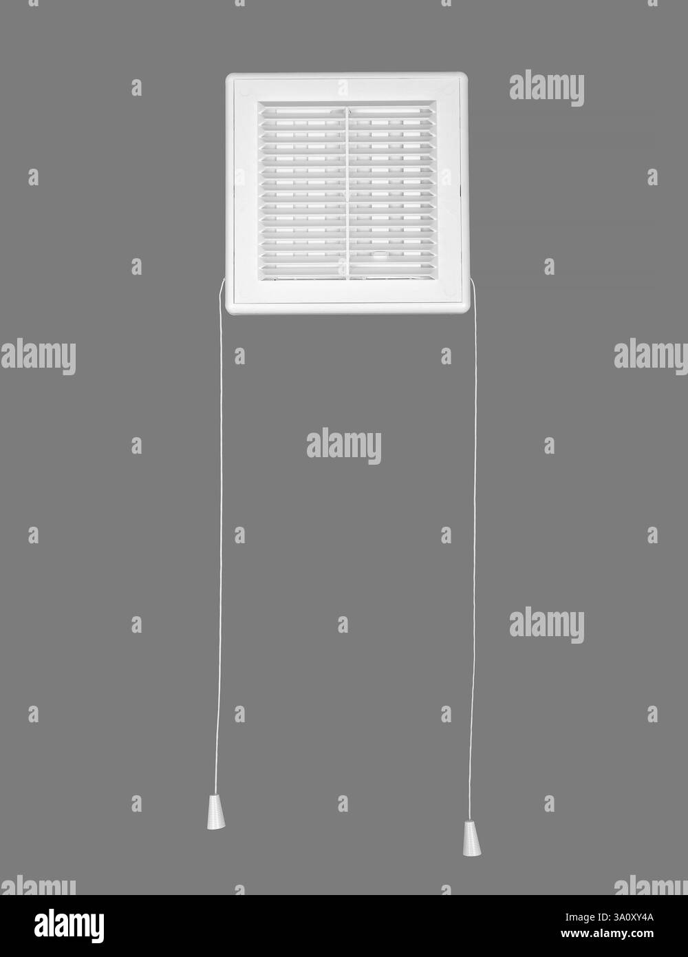 White ventilation grate on a gray background. Square shape, plastic material. Stock Photo