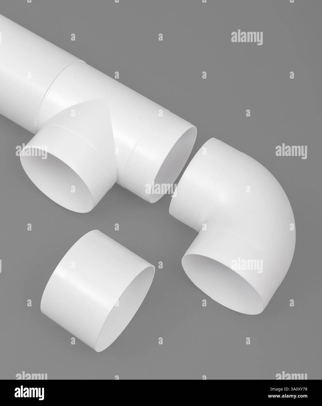 White round plastic pipe on a gray background. Ventilation system Stock ...