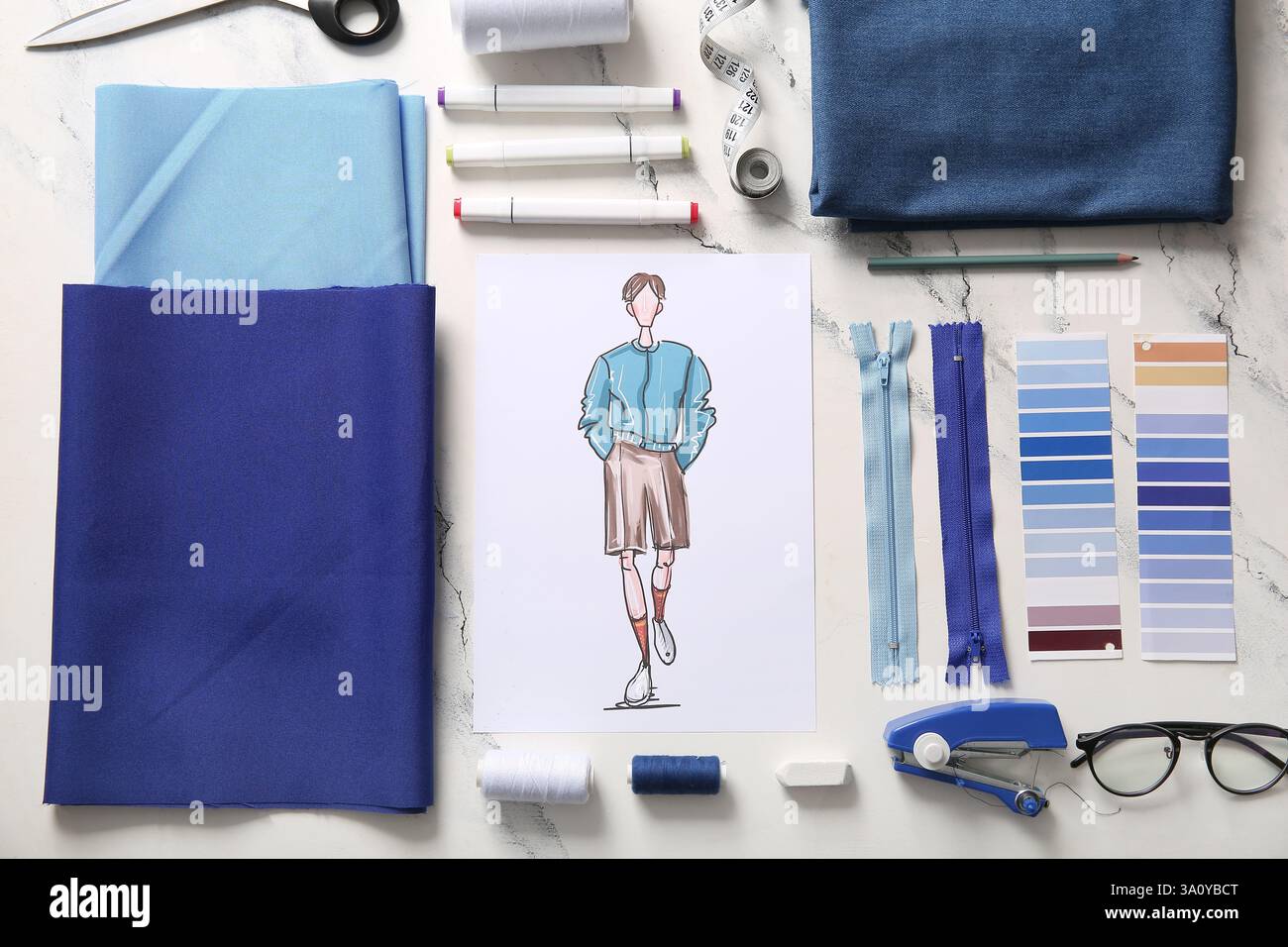 Composition with fabric and sketch of male clothes on light background ...