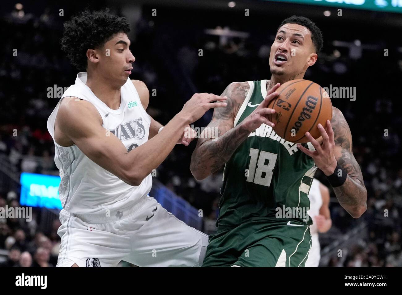 Milwaukee Bucks' Kyle Kuzma gets past Dallas Mavericks' Max Christie ...