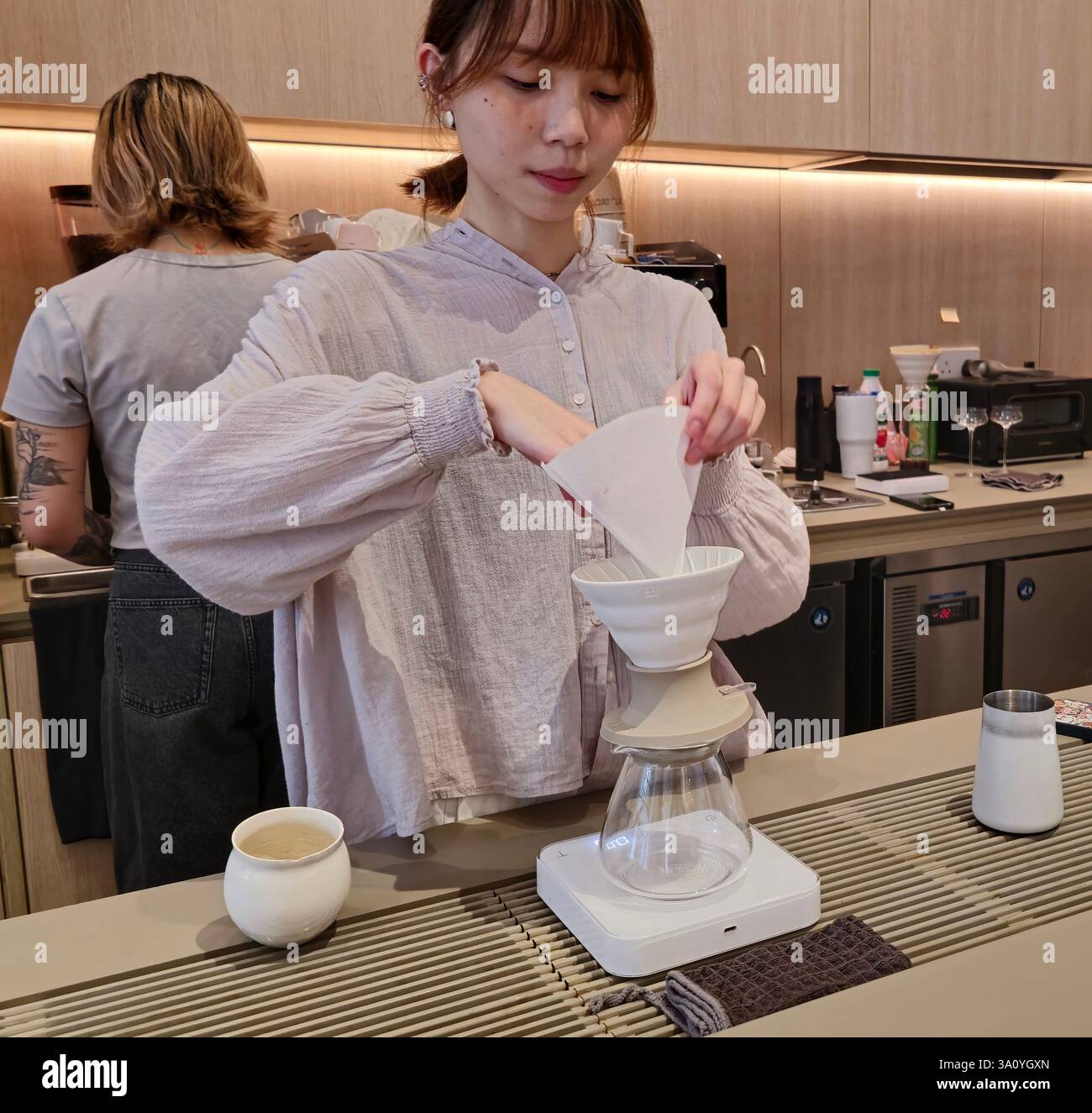 The stylish commaa cafe (Coffee meets art and architecture) in Sheung Wan, Hong Kong. - Smartphone Captured Stock Image