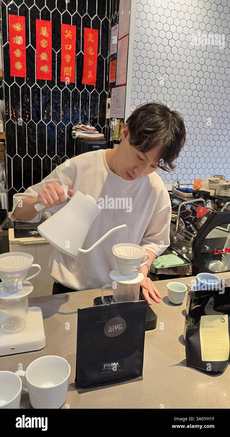 Flow coffee shop in Sham Shui Po, Kowloon, Hong Kong. - Smartphone Captured Stock Image