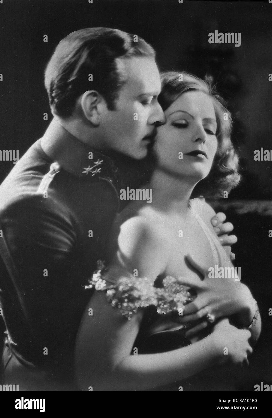 Actors Greta Garbo and Conrad Nagel in the movie The Mysterious Lady ...