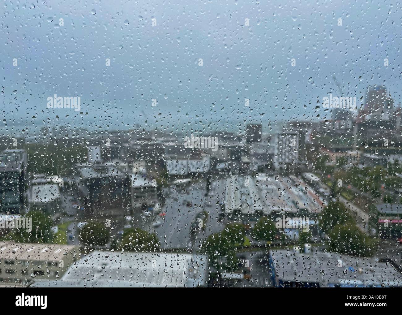 Auckland businesses seen through a raindrop window Stock Photo