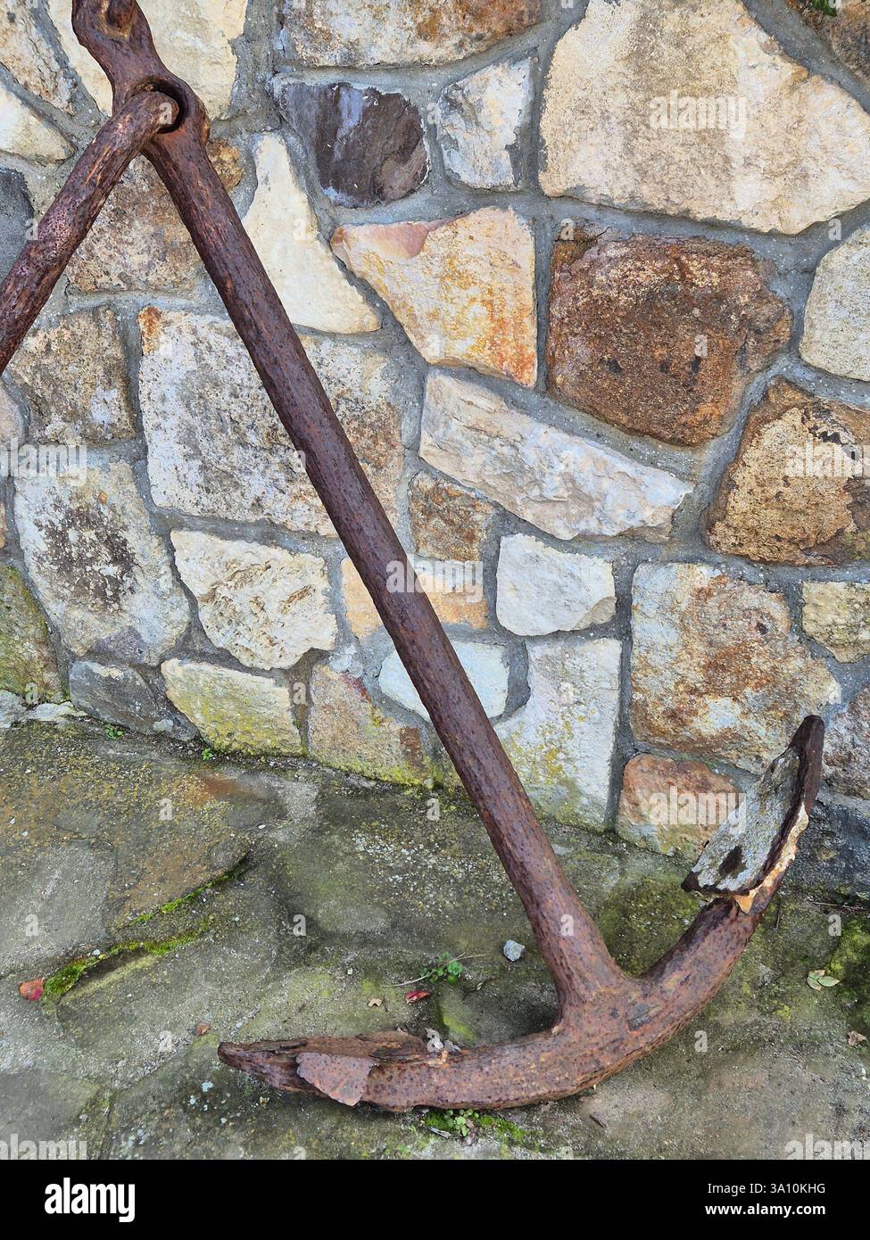 vintage sea anchor on the shore - Smartphone Captured Stock Image