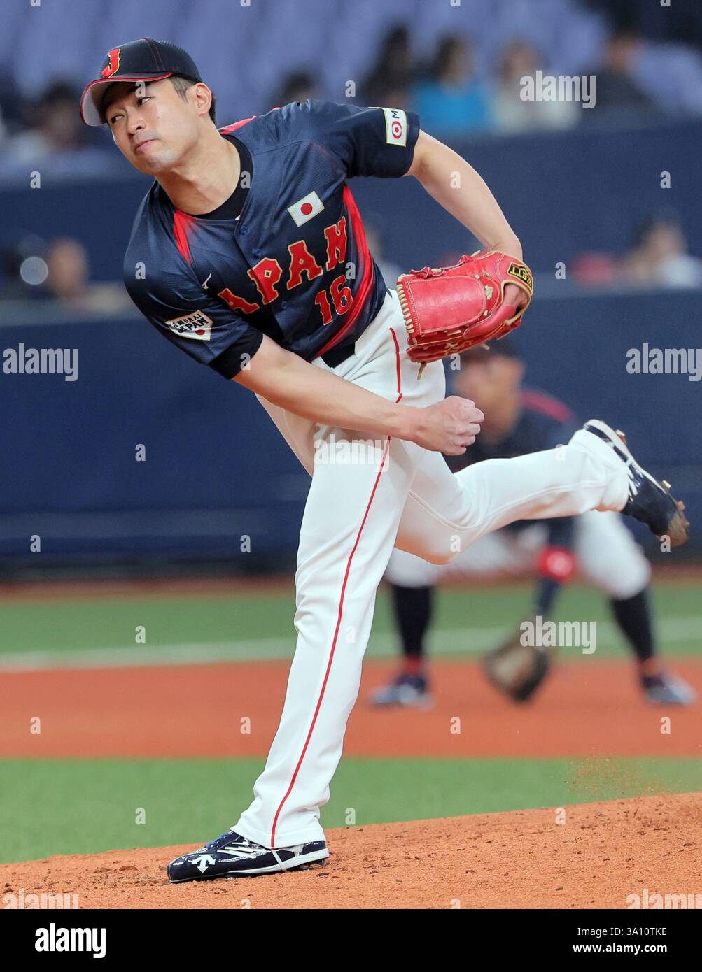 Japanese starter Atsuki Taneichi throws a ball during Raxus Samurai