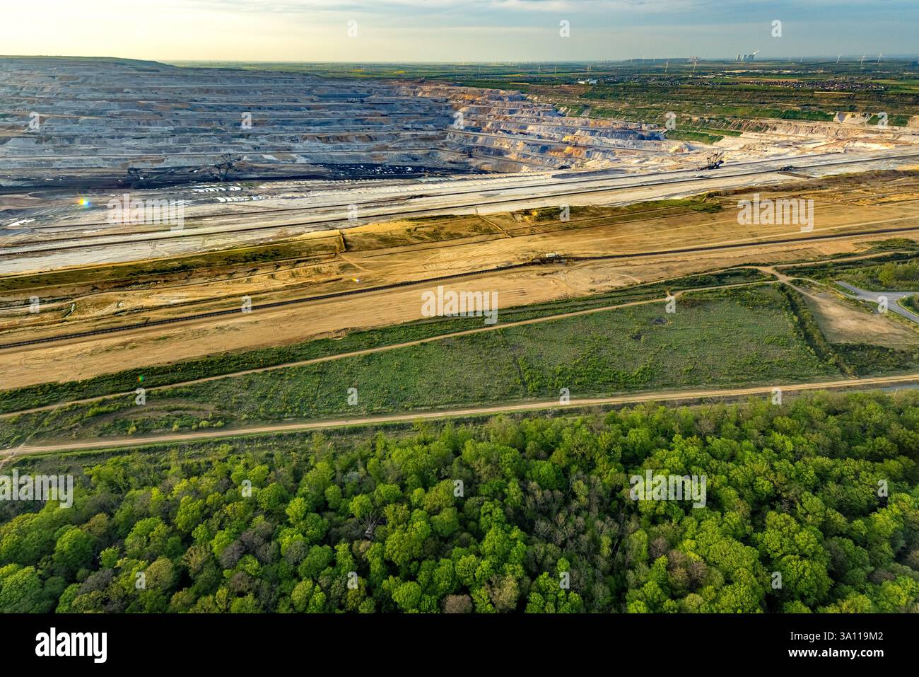 Aerial view, opencast lignite mine Hambacher Forst, nature reserve Bürgewald Blatzheimer Bürge, bucket wheel excavator, distant view, Buir, Kerpen, Rh Stock Photo