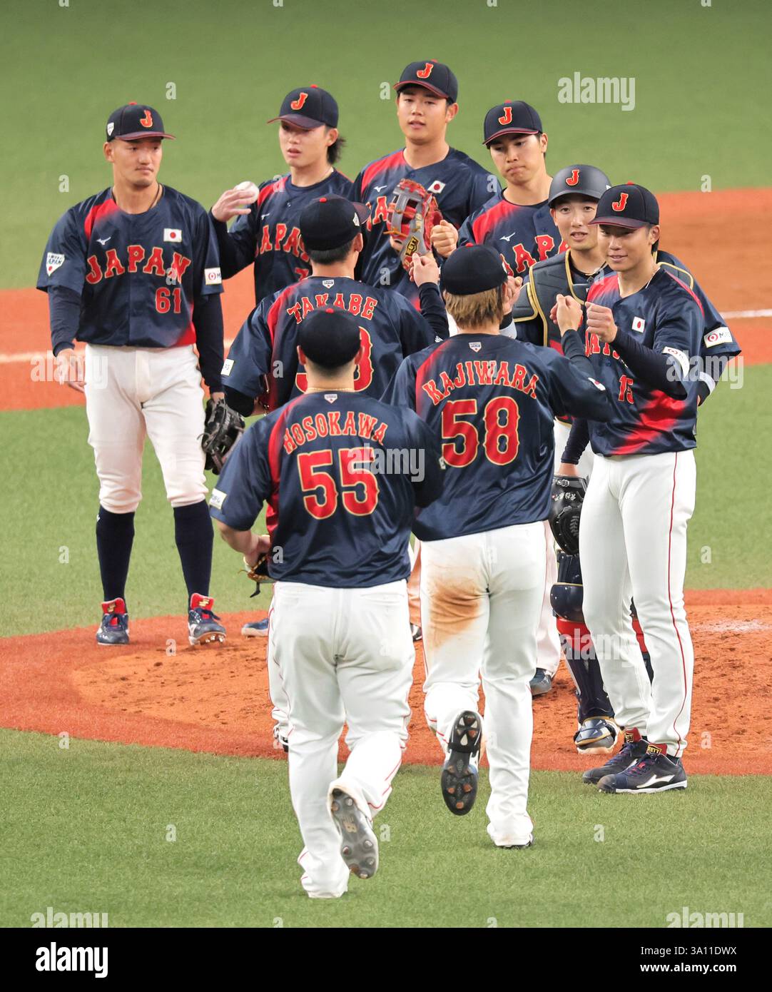 Japan's national team members celebrate after winning Raxus Samurai