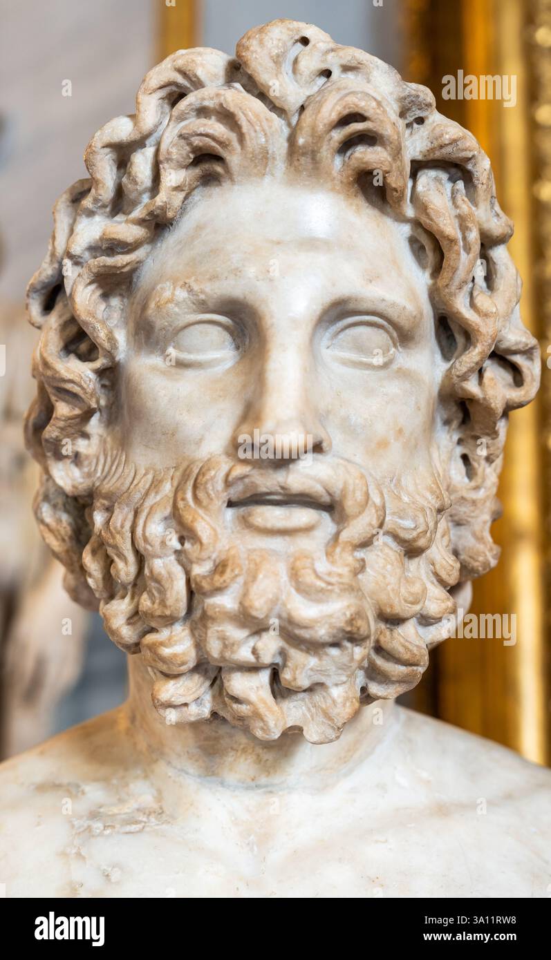 Close-up on head of ancient marble statue representing a man with lots ...