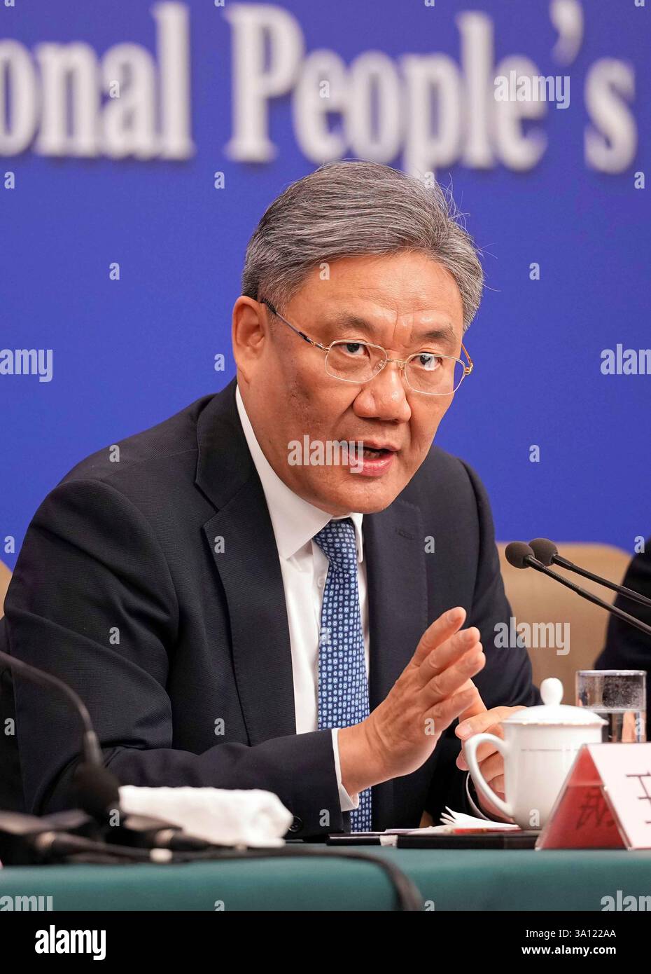 Chinese Commerce Minister Wang Wentao answers questions at a press ...