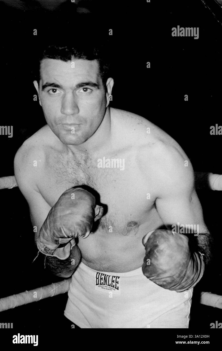 Light heavyweight champion Joey Maxim is weighed in for