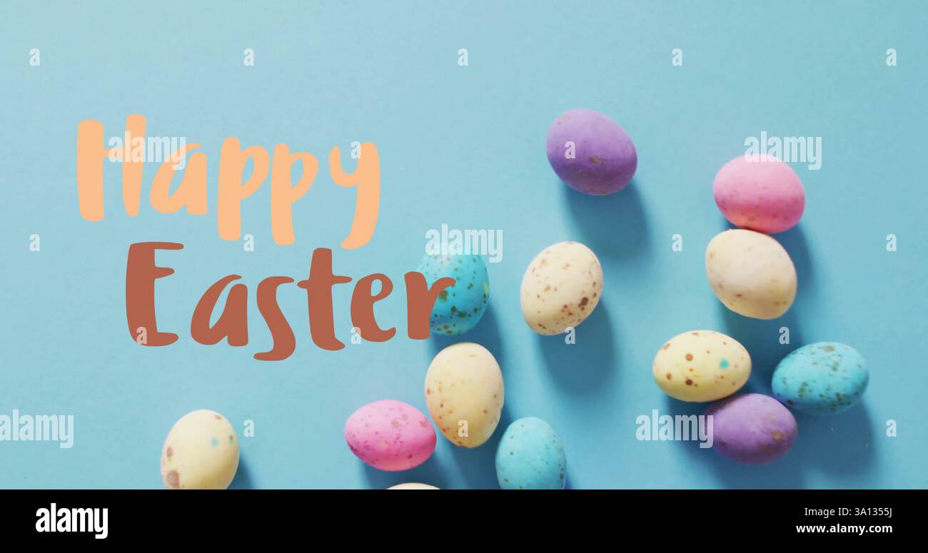 Image of happy easter text over easter eggs Stock Photo