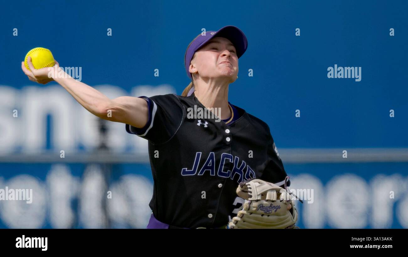 Stephen F. Austin outfielder Chloe Reneau (3) throws during an NCAA ...