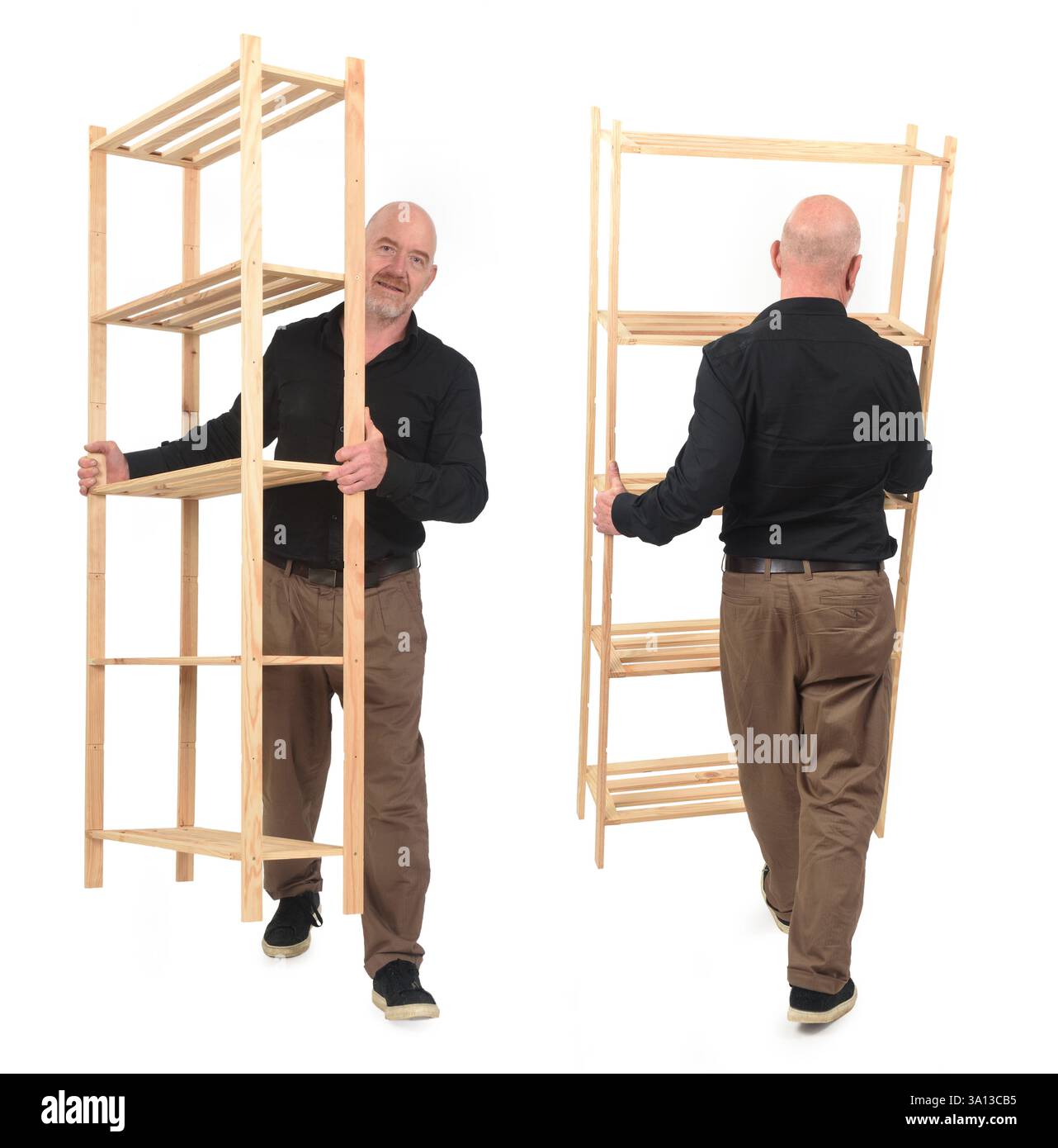 front and back view of a man walking carrying a wooden shelf on white ...