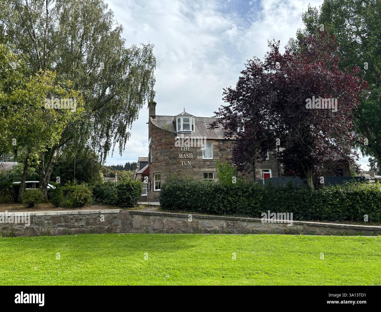 Beautiful Scottish Highland town of Aberlour in Speyside in Scotland. Ancient stone buildings and village views of buildings. Scottish tourist attract - Smartphone Captured Stock Image