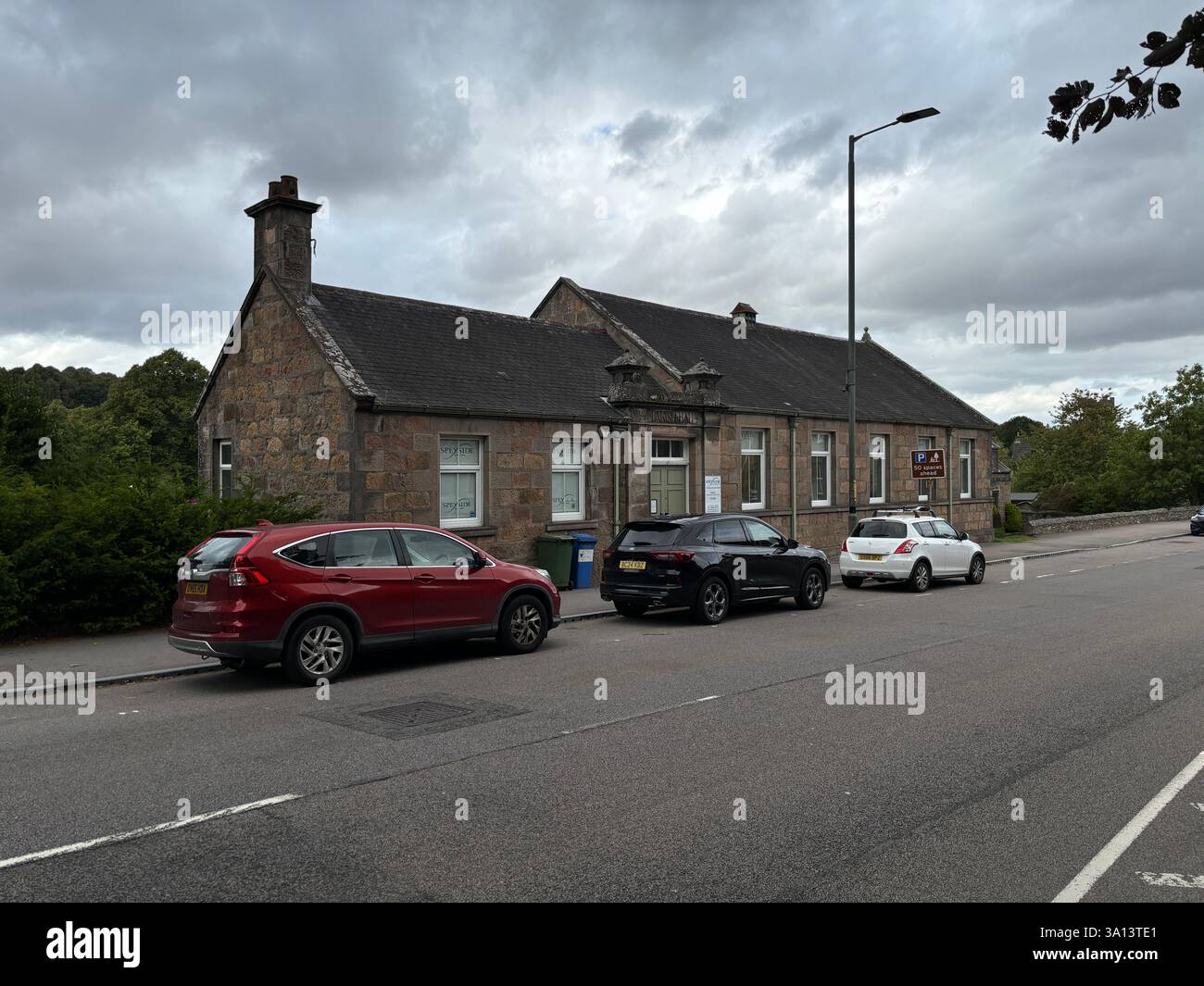 Beautiful Scottish Highland town of Aberlour in Speyside in Scotland. Ancient stone buildings and village views of buildings. Scottish tourist attract - Smartphone Captured Stock Image