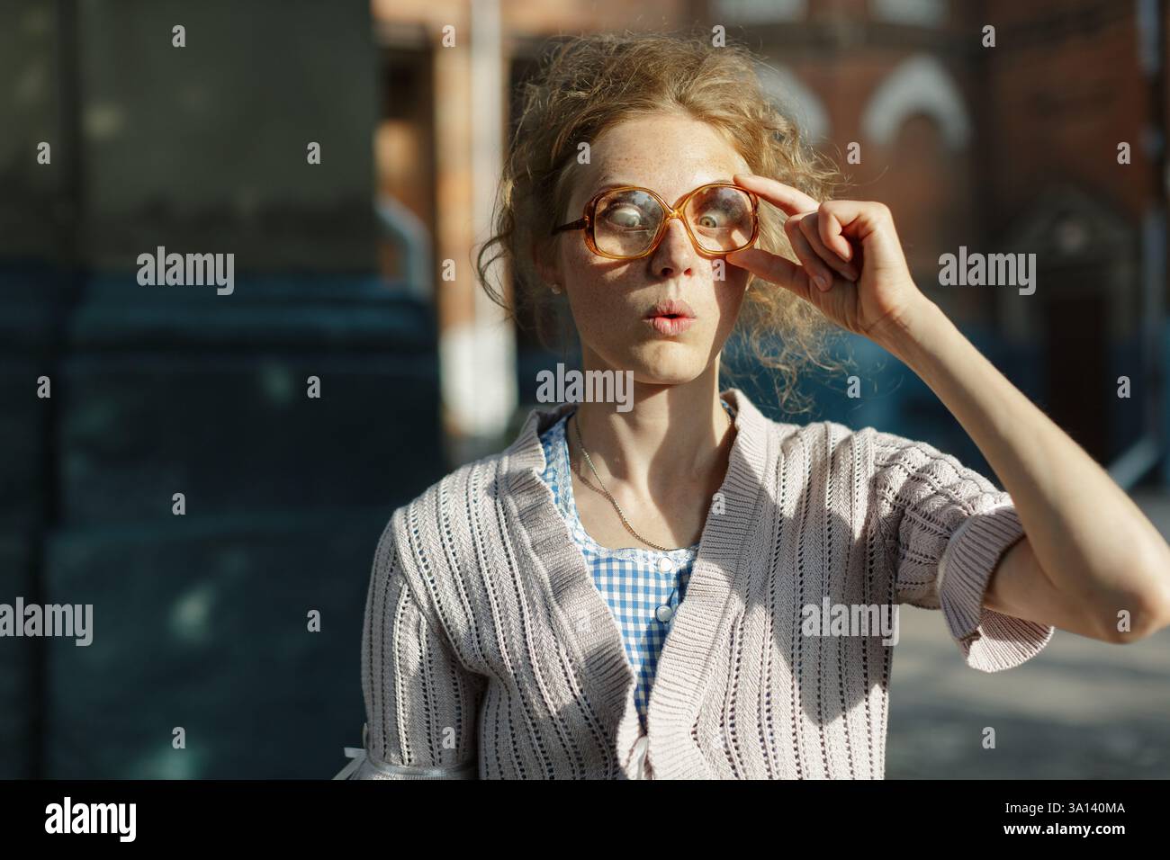 Woman curly hair glasses hi-res stock photography and images - Alamy