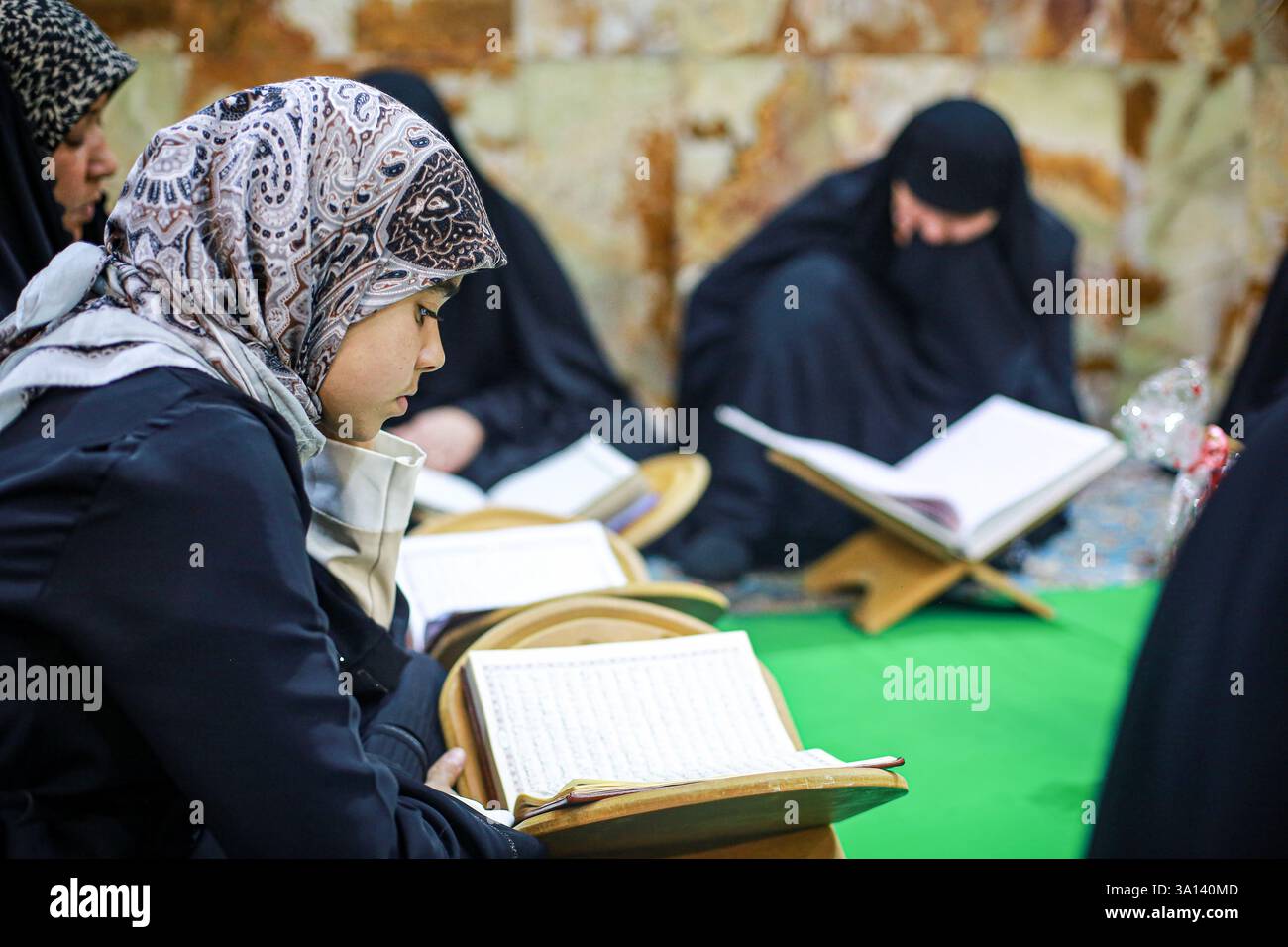 06 March 2025, Iraq, Hillah: Shia Muslim women attend Quran recitation ...