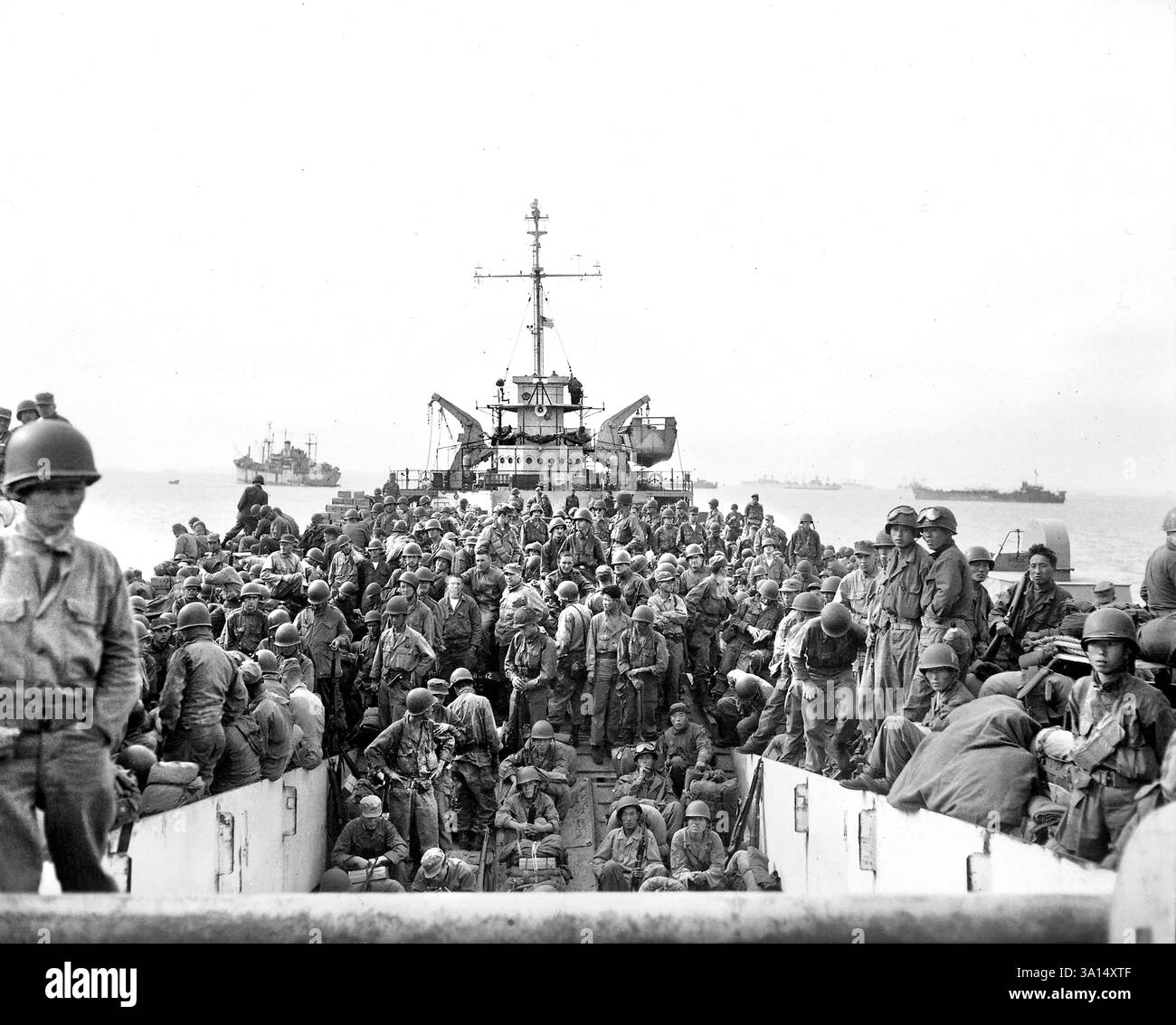 Troops of U.S. 31st Infantry Regiment aboard LST's, landing at Inchon Harbor, Korea, U.S. Army Signal Corps, September 18, 1950 Stock Photo