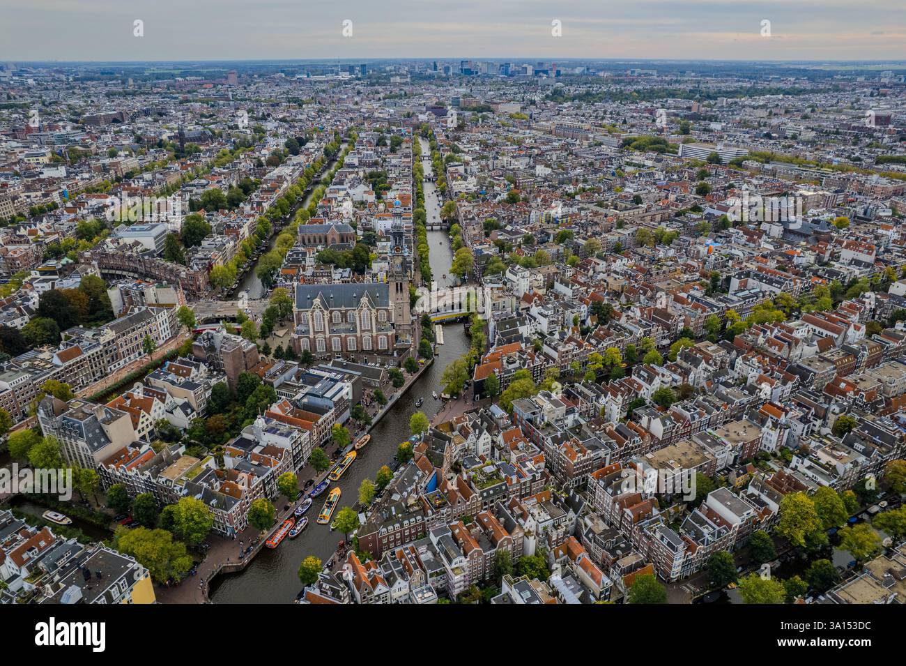 Aerial view of Amsterdam, Netherlands showcases its iconic canal houses ...