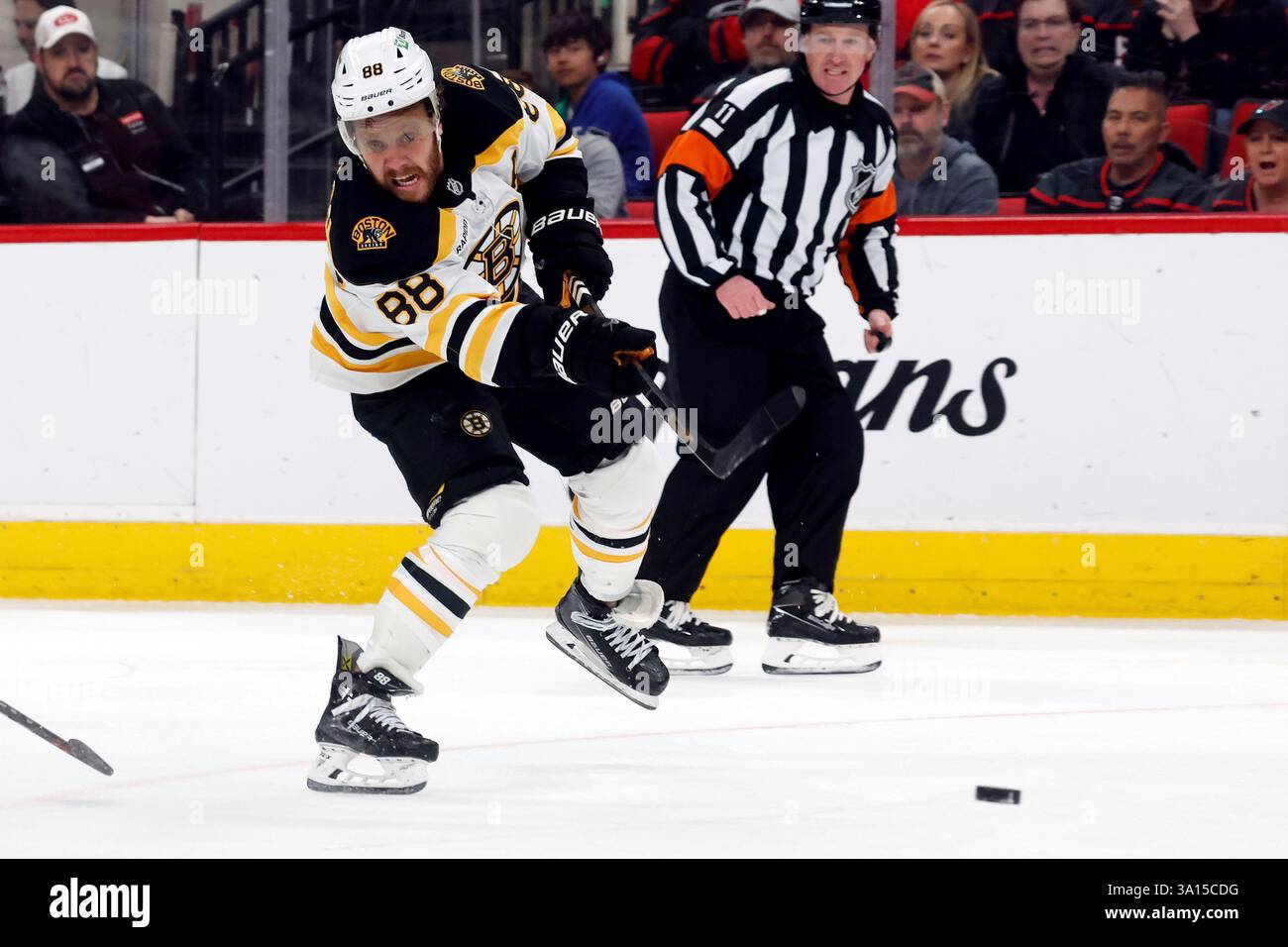 Boston Bruins' David Pastrnak (88) shoots against the Carolina ...