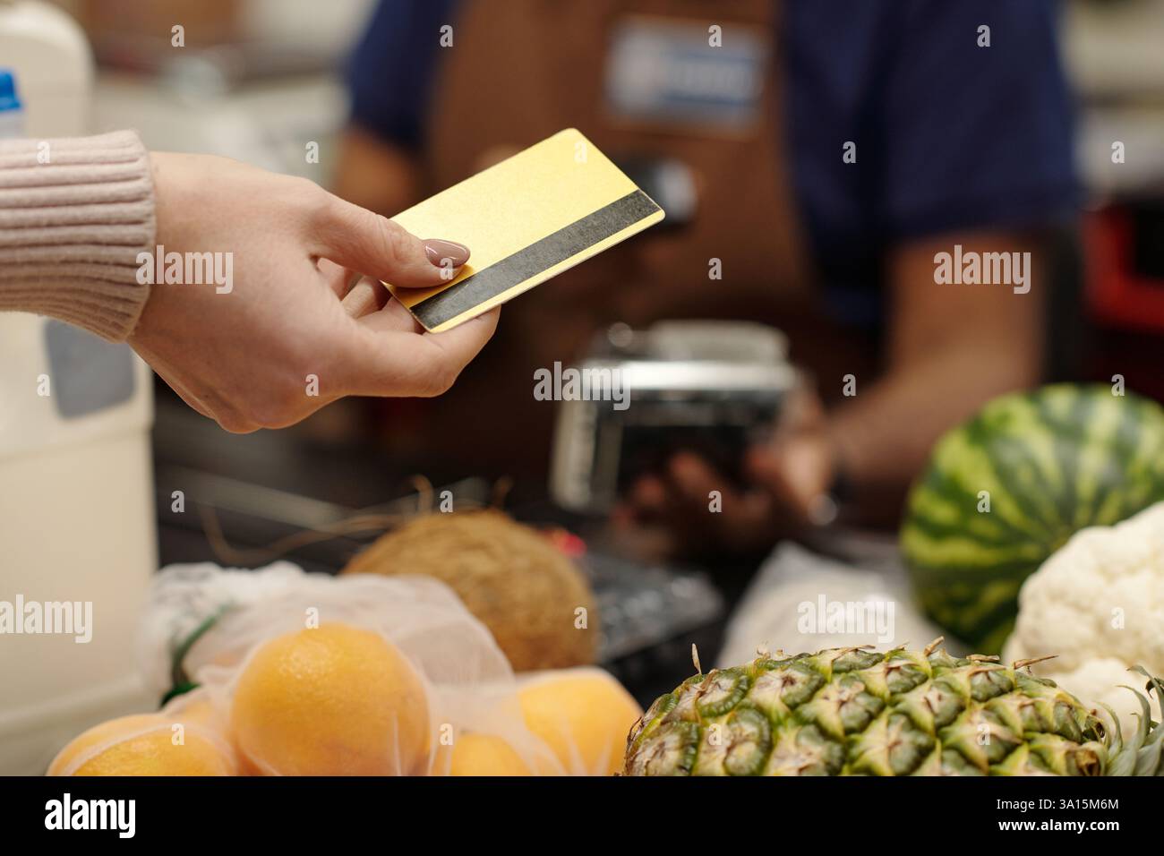 Payment in Store Stock Photo - Alamy