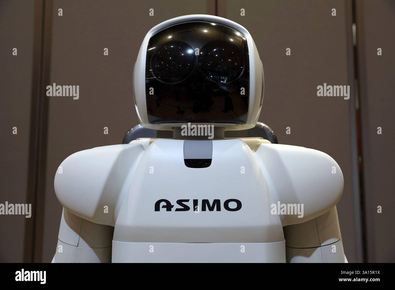 A photo shows ASIMO (Advanced Step in Innovative Mobility), humanoid ...