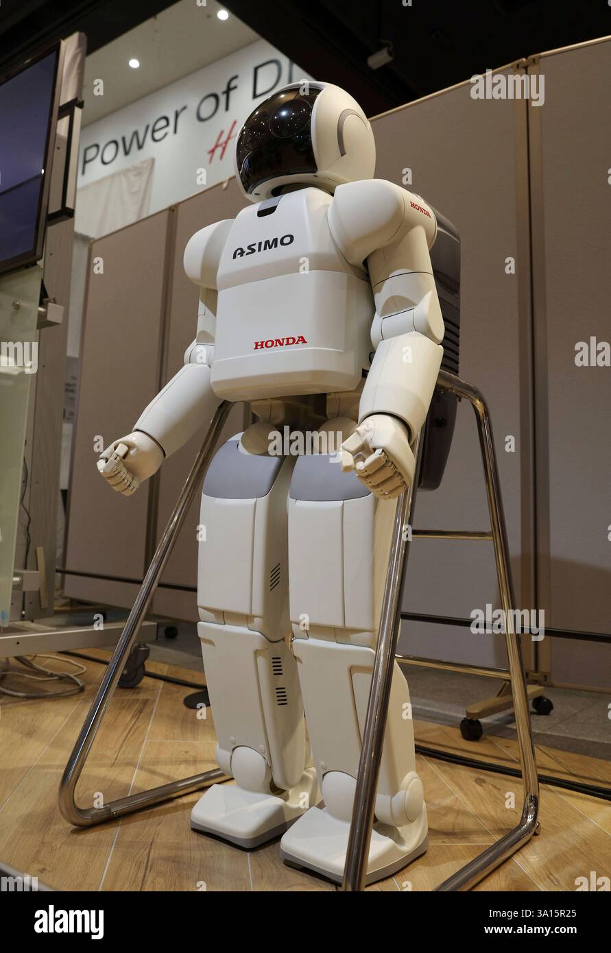 A photo shows ASIMO (Advanced Step in Innovative Mobility), humanoid ...