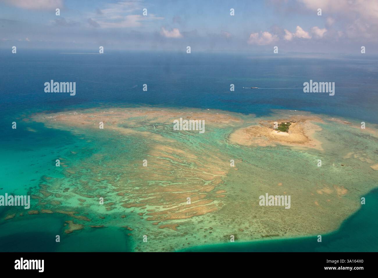 Photo shows an aerial view of one of the uninhabited islands off