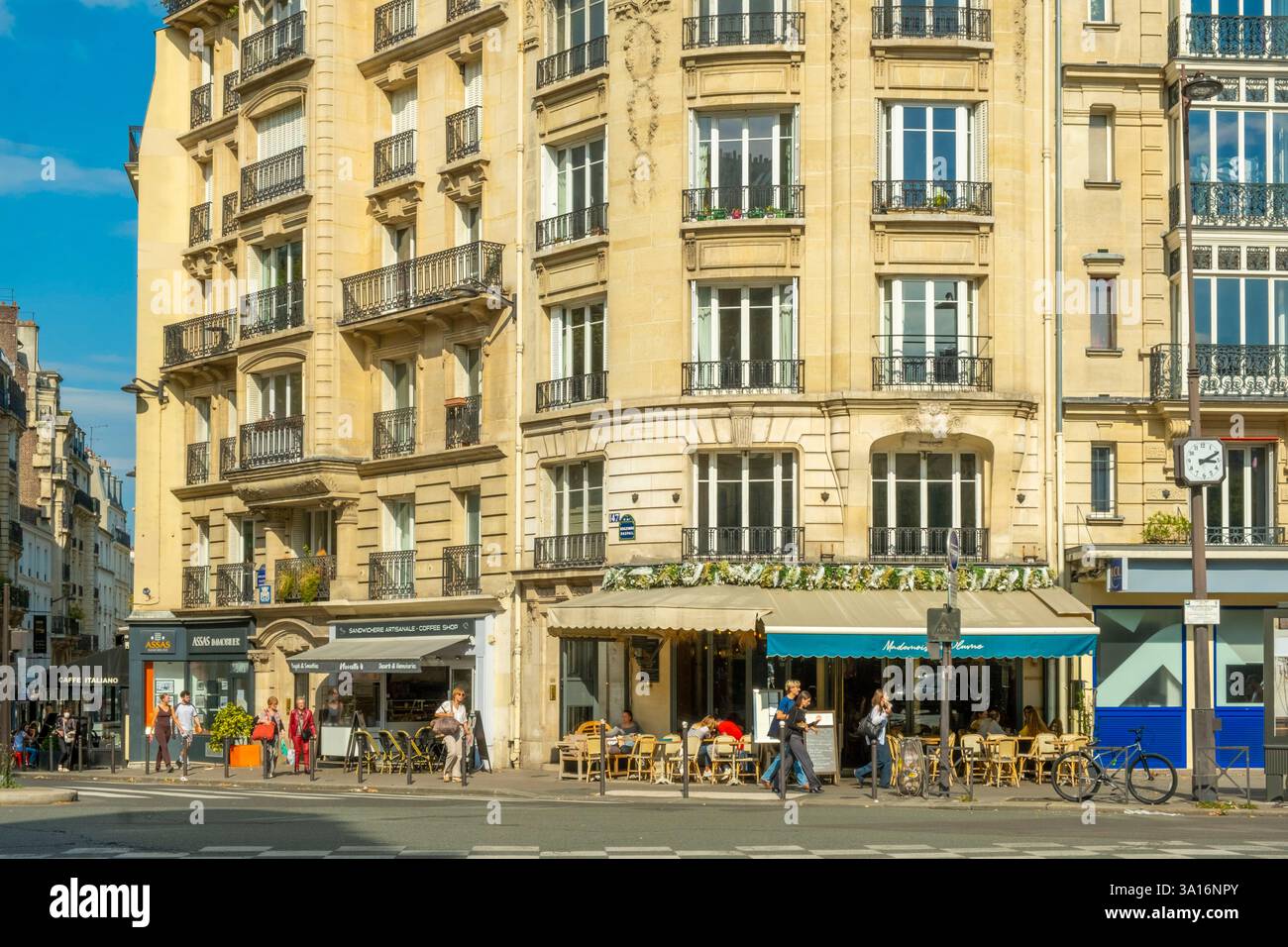 France, Paris, Haussmannian building on the corner of Boulevard Raspail ...