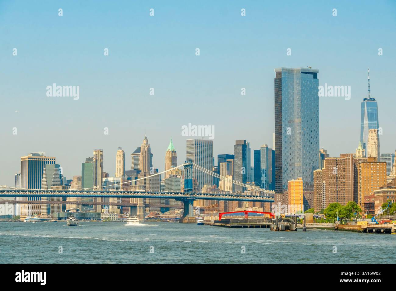 United States, New York State, New York City, sailing along the East River with the New York Ferry, lower Manhattan and Manhattan Bridge Stock Photo