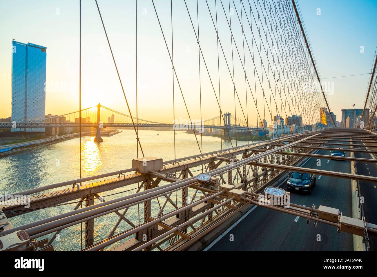 United States, New York State, New York City, view from Brooklyn Bridge over Manhattan Bridge at sunrise Stock Photo