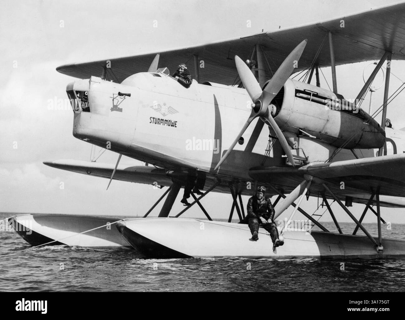 Heinkel He 59 seaplane at a naval air base. The aircraft is moored to a ...