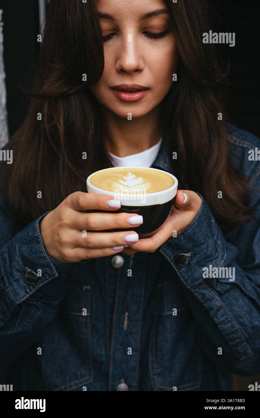 Happy girl black ceramic hi-res stock photography and images - Alamy