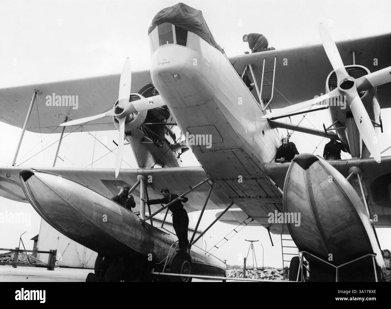 Heinkel He 59 seaplane at a naval air base. Ground crew during ...