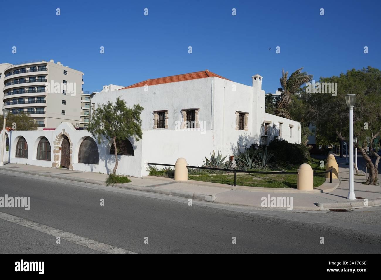 Traditional white stone houses under a blue sky Stock Photo - Alamy