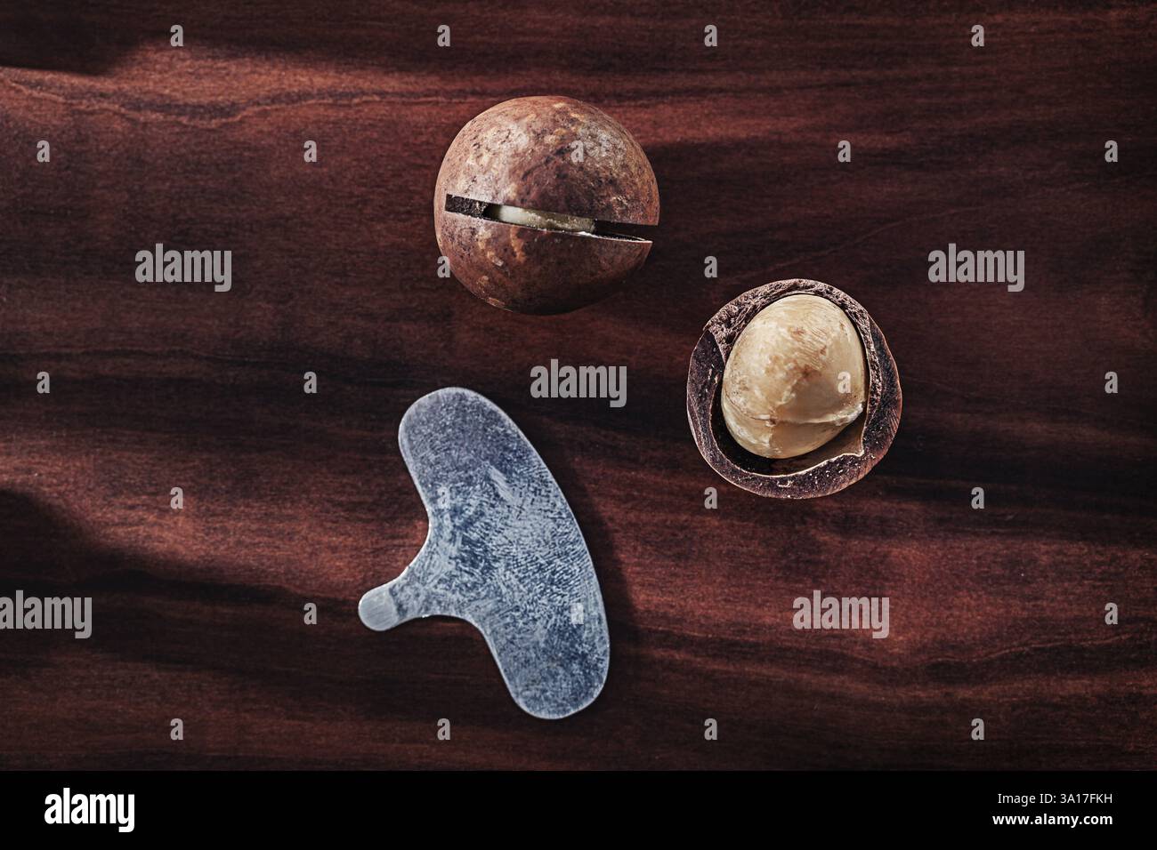 .Macadamia Nuts On Vintage Wooden Board Stock Photo