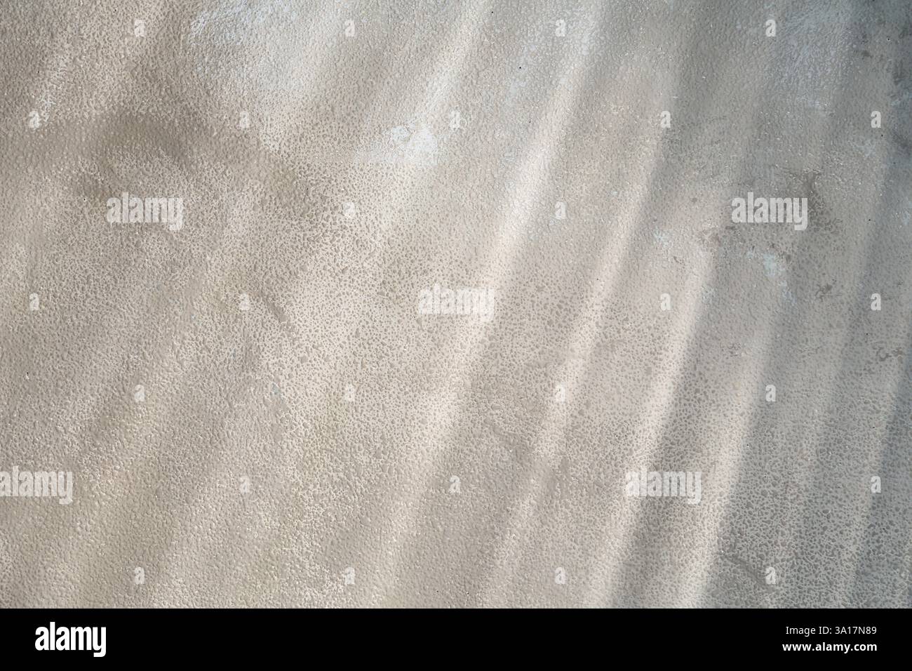Light and shadows falling on color textured background Stock Photo