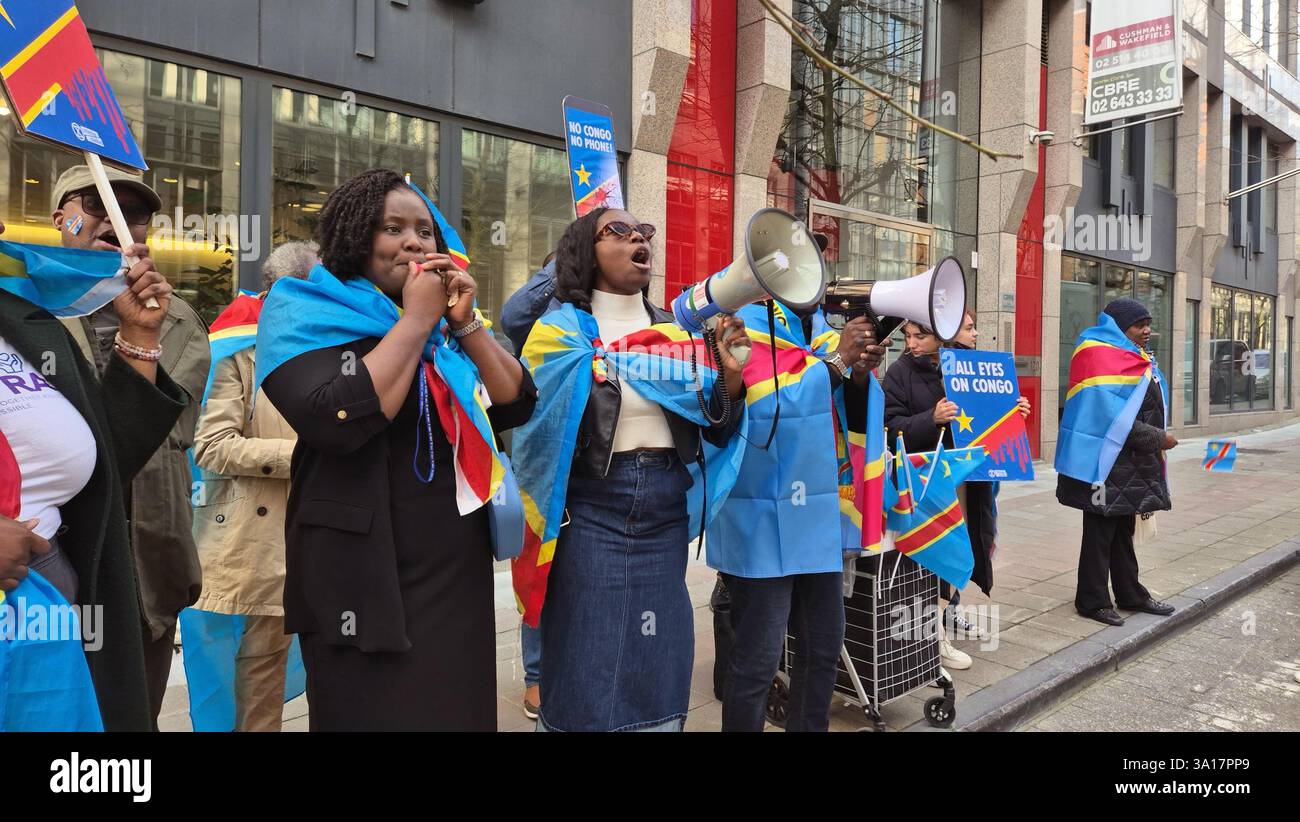 People hold a demonstration to denounce Rwanda's aggression in eastern ...