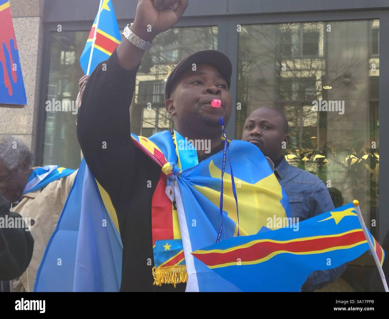 People hold a demonstration to denounce Rwanda's aggression in eastern ...