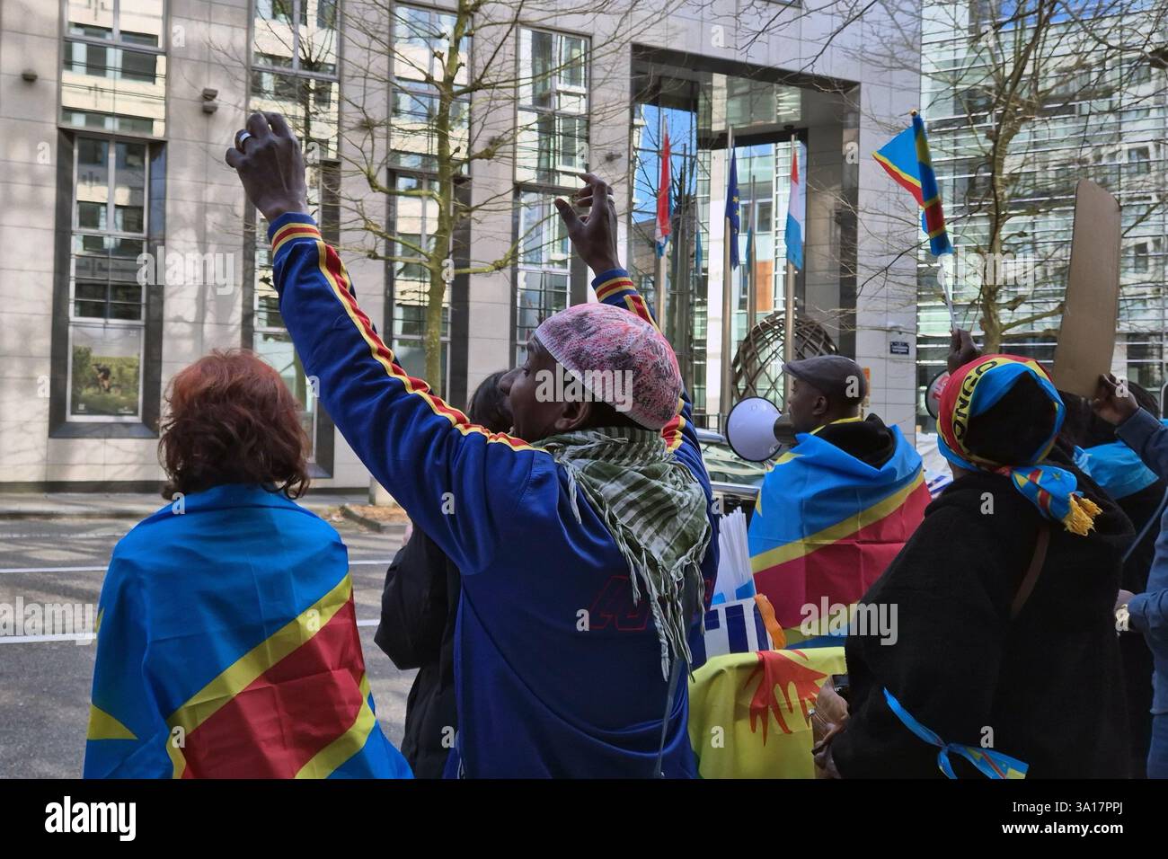 People hold a demonstration to denounce Rwanda's aggression in eastern ...
